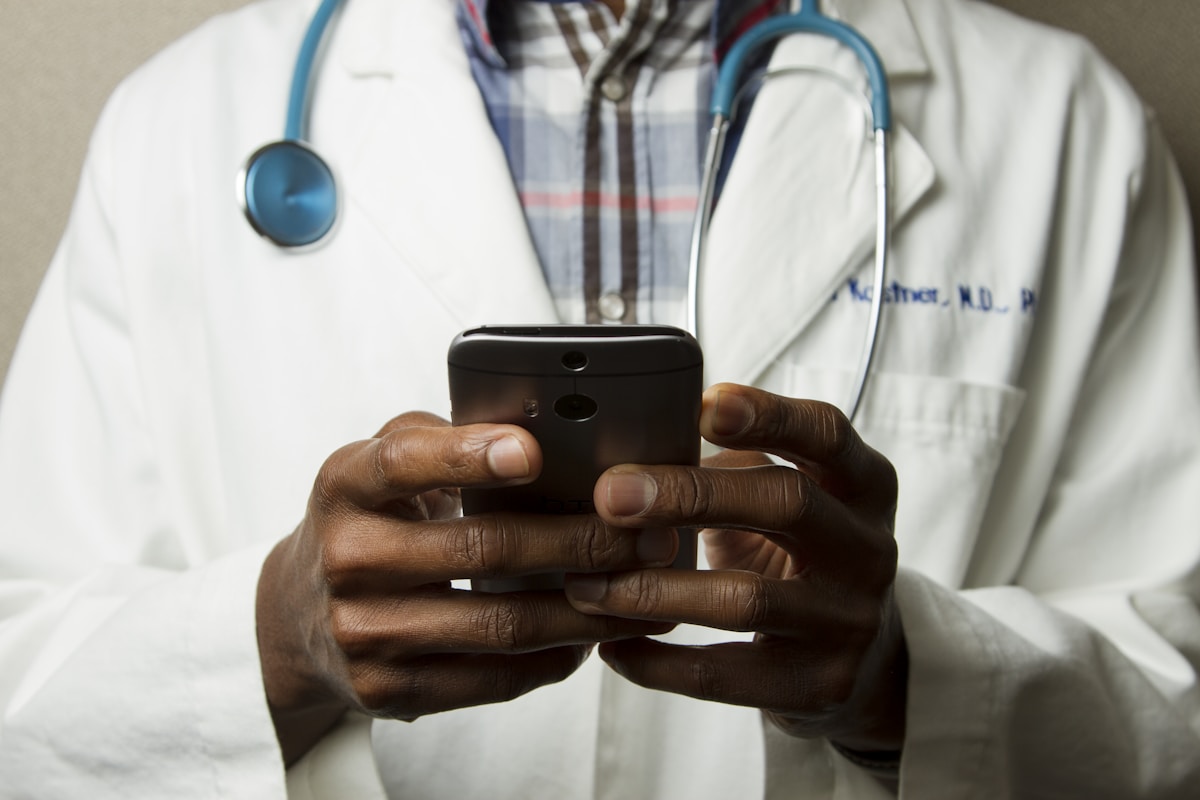 Healthcare technology professional reviewing medical software on a computer